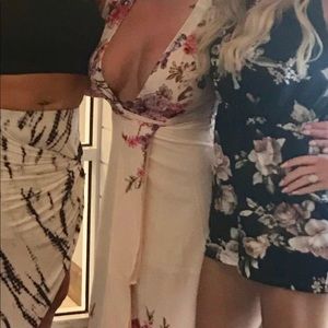 Extremely low cut floral wrap dress